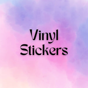 A purple, pink and blue watercolor gradient background with the words Vinyl Stickers in the foreground